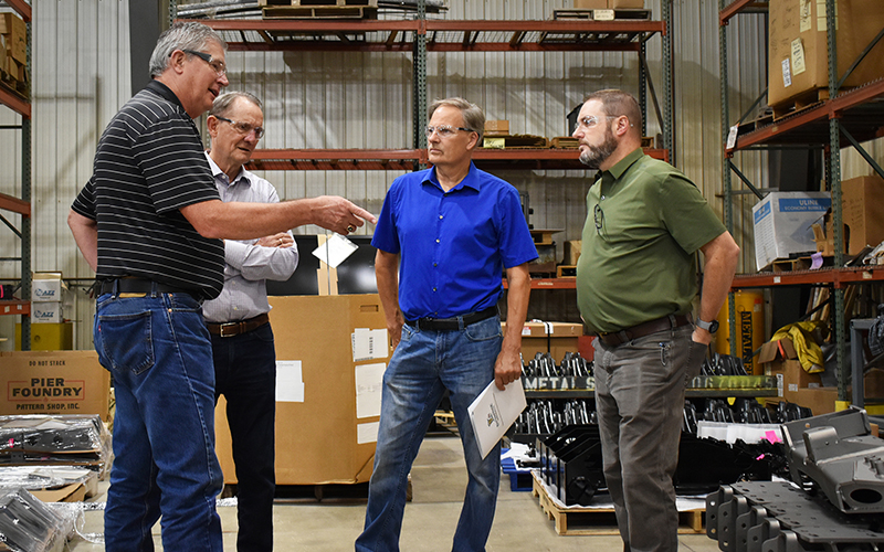 Metal Services of Blooming Prairie CEO Kurt Schrom speaking with Senator Gene Dornink.