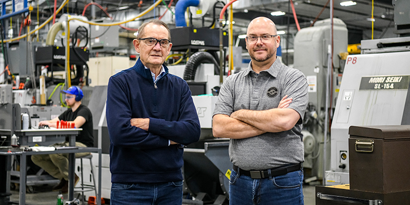 Bob Kill and Micah Ricke, president and CEO of TEAM Industries in Bagley, Minn. 